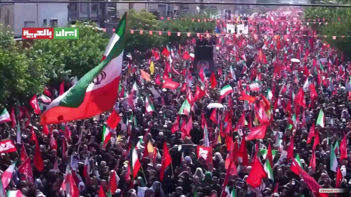 الجزيرة: الرايات الحمراء في تشييع القائد الشهيد تحمل دلالات رمزية خاصة